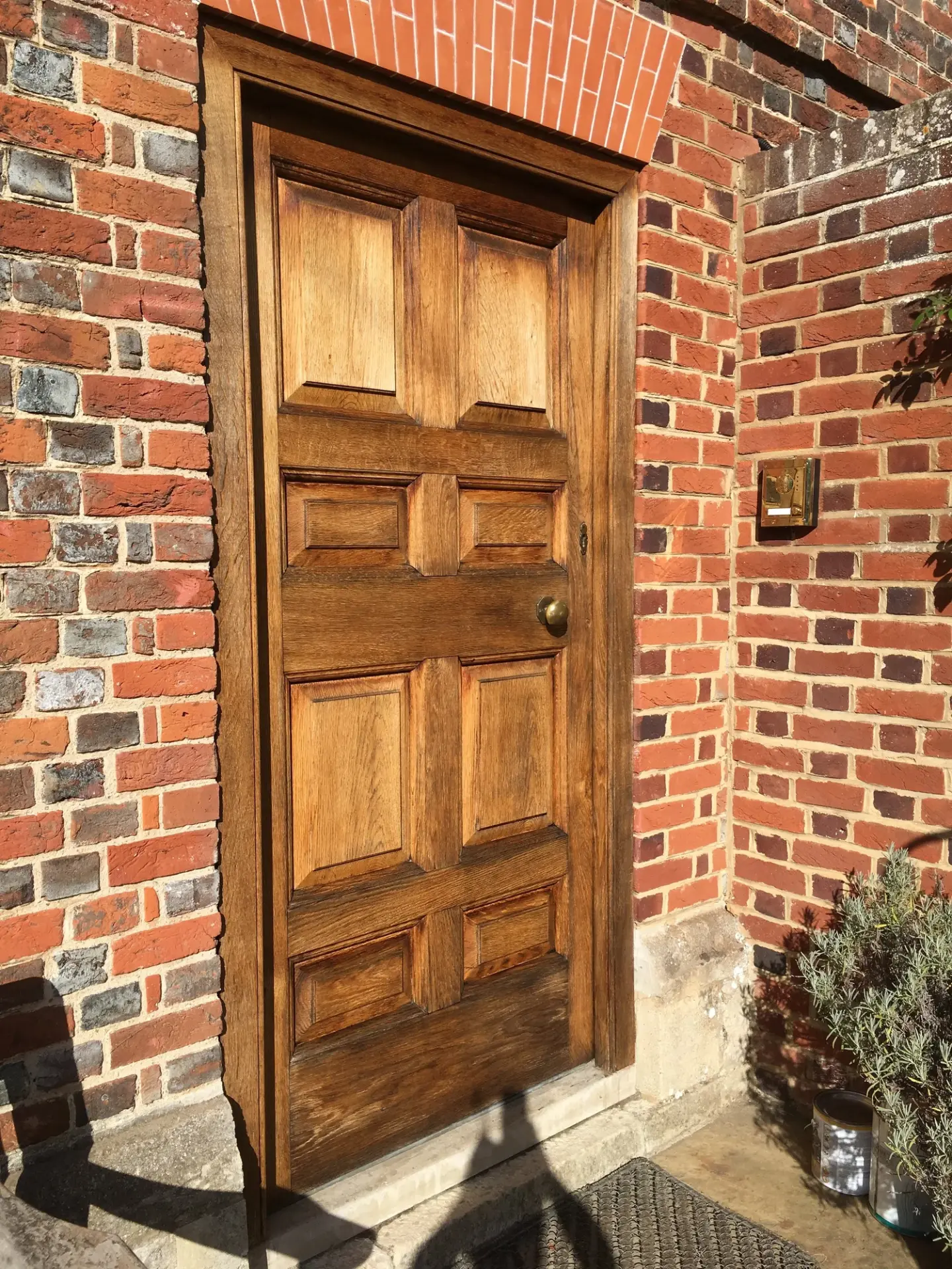 Oak front door after restoration, stripped and refinished
